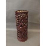 An enamelled cast iron stick stand with pierced decoration of depicting pelicans, 24" high