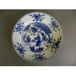 A Chinese blue and white porcelain bowl decorated with a sage and two servants, 6 character mark