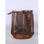 A Louis Vuitton style shoulder bag with the monogram design and detachable purse, 15" x 17"