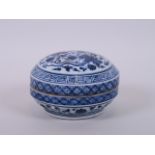 A Chinese blue and white porcelain pot and cover with phoenix decoration to lid, six character