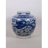 A Chinese blue and white porcelain storage jar with dragon decoration, 9" high