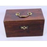 A C19th rosewood tea caddy of rectangular form having ebony and boxwood spiral crossbanding, 8" x