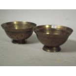 A pair of Chinese brass bowls with dragon decoration, 10" diameter