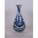 A Chinese Ming style blue and white porcelain pear shaped vase, 11" high