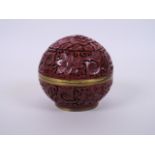 A Chinese cinnabar lacquer pot and cover with lotus flower decoration, six character mark to base,