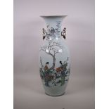 A large late C19th/early C20th Chinese polychrome porcelain vase with gilt handles, decorated with