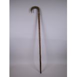 A hedgerow walking stick with horn handle and white metal cuff, 32½" long