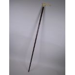 A late C19th/early C20th ivory handled walking stick, 35½" long