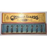 Britains set 312, Grenadier Guards in Greatcoats with officer in original Whisstock box (VG, box