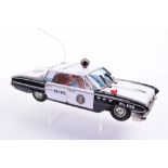 Nomura (Japan) Large Scale Tinplate Friction Drive Buick Police Patrol, black/white body, detailed