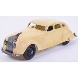 Dinky Toys 30a Chrysler Airflow Saloon, cream body, black ridged wheel hubs, in good condition.