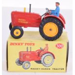 Dinky Toys 300 Massey Harris Tractor, red body, yellow plastic front wheel hubs, yellow metal rear