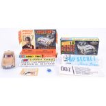 Corgi Toys 261 James Bond Aston Martin from the Film “Goldfinger” gold body, model is in fair to