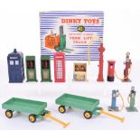 Dinky Toys Small Quantity Of Accessories including: 42a Police Call Box, 49a Bowser petrol pump, 49b