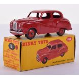 Dinky 161 Austin Somerset saloon, red body and hubs, correct colour spot box, near mint, box good.