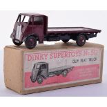 Dinky boxed 512 Guy Flat truck, 1st type maroon cab, back and hubs, black chassis and wings, plain