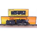 Rail King by MTH electric trains, 0 gauge 4-6-0 Camelback steam engine and tender, engine No.631 and