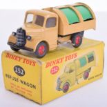 Dinky Toys 252 Bedford Refuse Wagon, tan body, green shutters, red wheel hubs, with windows ,in near