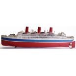 A large Bing tinplate clockwork three funnel Ocean Liner, 1920s, the hull painted in red and blue