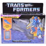 Boxed Hasbro G1 Transformers Target Master Triggerhappy 1986 issue, transforms from jet to robot and