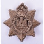 WW2 War Economy Devonshire Regiment Plastic Cap Badge