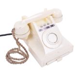 A rare ivory Bakelite type 328F extension telephone, 1954, impressed mark 164 54, With bell on/off