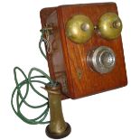 An early Steerhorn fork-cradle wall telephone, With twin gilt bells above microphone, magneto,