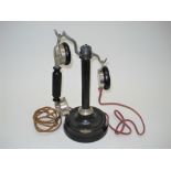 A good A. Burgunder candlestick table telephone, French, circa 1918, With ebonised wood and nickel-