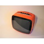 An Indesit type 12LGB portable television, Mid 1970s, 625-line, In very vivid headache-inducing