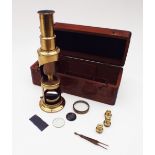 A drum compound monocular microscope, Mid 19th Century, Full brass body, plano mirror, four