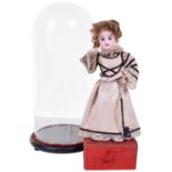 A standing Doll Tea-Drinker musical automaton, under glass dome, French, circa 1900, The painted