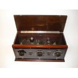 A Neutrodyne Silvertone wireless receiver, Mid 1920s, USA, with five valve line-up, angled coils,