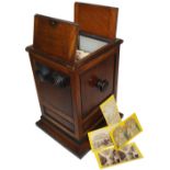 A late 19th century table carousel stereo viewer with cards, Circa 1890, with a selection of solo