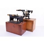 A Negretti & Zambra travelling microscope/cathetometer, With black painted case iron bedplate,