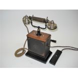A good Ericsson Corporation telephone, With ebonite and nickel-plated handset, scroll cradle,