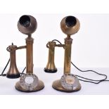 A near-pair of vintage/retro candlestick telephones, Each with dials, black fittings and braid,