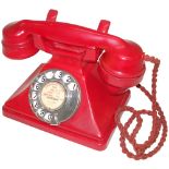 A rare pre-war type 234 red Bakelite telephone, Impressed mark 164-FH34, with the matching red