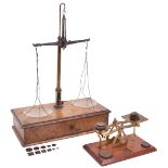 A good small chemist’s balance, Circa 1880, with brass support, steel balance arm and twin ground