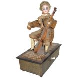 An early hand-crank cellist musical automaton, French, circa 1860, The seated boy cellist with