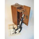 A small monocular microscope, by S.E.L., 1950’s, with single objective and ocular, company