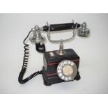 An Ericsson metal table telephone, With Arabic dial numerals, nickel-plated fittings, black