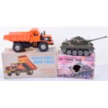 Two Battery Operated Marx Plastic Toys, including a Firing Tank in Camouflage and a Power Brute Dump