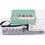 Yamaha SHS-10 FM Digital Keyboard With Midi, complete with instruction book and a electronic table