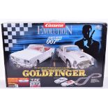 Carrera Evolution“Goldfinger” James Bond 007 1:32 Scale Slot Car Racing Set, with Aston Martin DB5