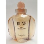 A large perfumer’s window display bottle for Dune, Christian Dior