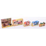 Four Boxed Dinky Toys including racing cars