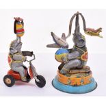 Two tinplate clockwork performing Elephants, German 1950s