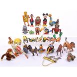 Collection of wind-up novelty animals and toys, post war