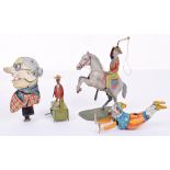 Four tinplate Novelty toys