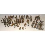 Various hollowcast toy soldiers in khaki